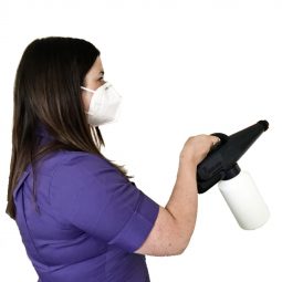 A lady using the GG 1800 Portable Fogger