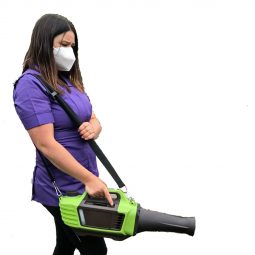 A lady using the Greengauge Travel 2000 Fogger